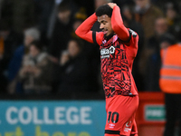 Josh Koroma (10 Huddersfield) holds his head after going close during the Sky Bet League 1 match between Cambridge United and Huddersfield T...