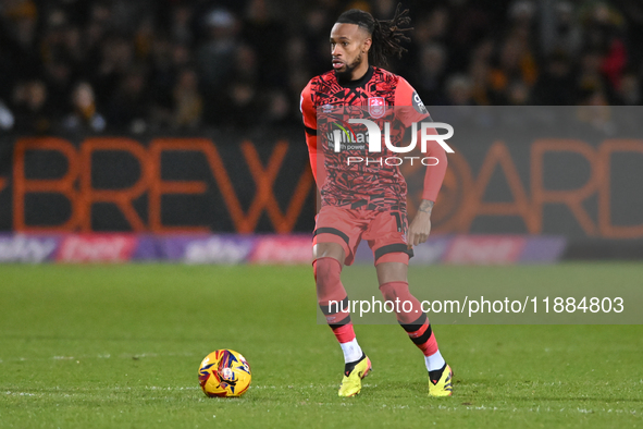 David Kasumu (18 Huddersfield) controls the ball during the Sky Bet League 1 match between Cambridge United and Huddersfield Town at the Cle...