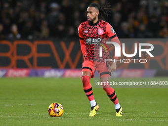 David Kasumu (18 Huddersfield) controls the ball during the Sky Bet League 1 match between Cambridge United and Huddersfield Town at the Cle...