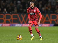 David Kasumu (18 Huddersfield) controls the ball during the Sky Bet League 1 match between Cambridge United and Huddersfield Town at the Cle...