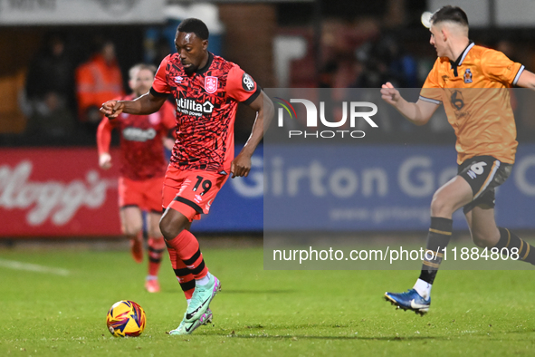 Freddie Ladapo, number 19 for Huddersfield, controls the ball during the Sky Bet League 1 match between Cambridge United and Huddersfield To...