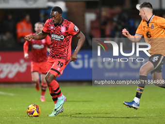 Freddie Ladapo, number 19 for Huddersfield, controls the ball during the Sky Bet League 1 match between Cambridge United and Huddersfield To...