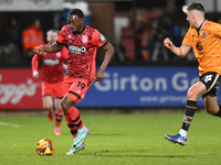 Freddie Ladapo, number 19 for Huddersfield, controls the ball during the Sky Bet League 1 match between Cambridge United and Huddersfield To...