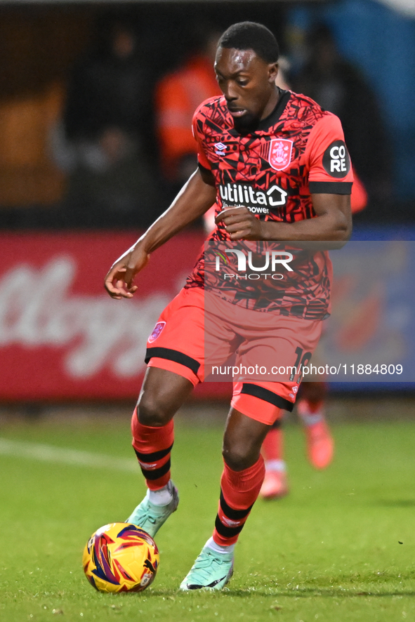 Freddie Ladapo (19 Huddersfield) goes forward during the Sky Bet League 1 match between Cambridge United and Huddersfield Town at the Cledar...