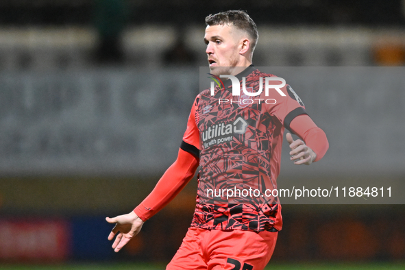 Danny Ward, 26, from Huddersfield, participates in the Sky Bet League 1 match between Cambridge United and Huddersfield Town at the Cledara...