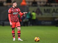 Ben Wiles (8 Huddersfield) prepares to take a free kick during the Sky Bet League 1 match between Cambridge United and Huddersfield Town at...