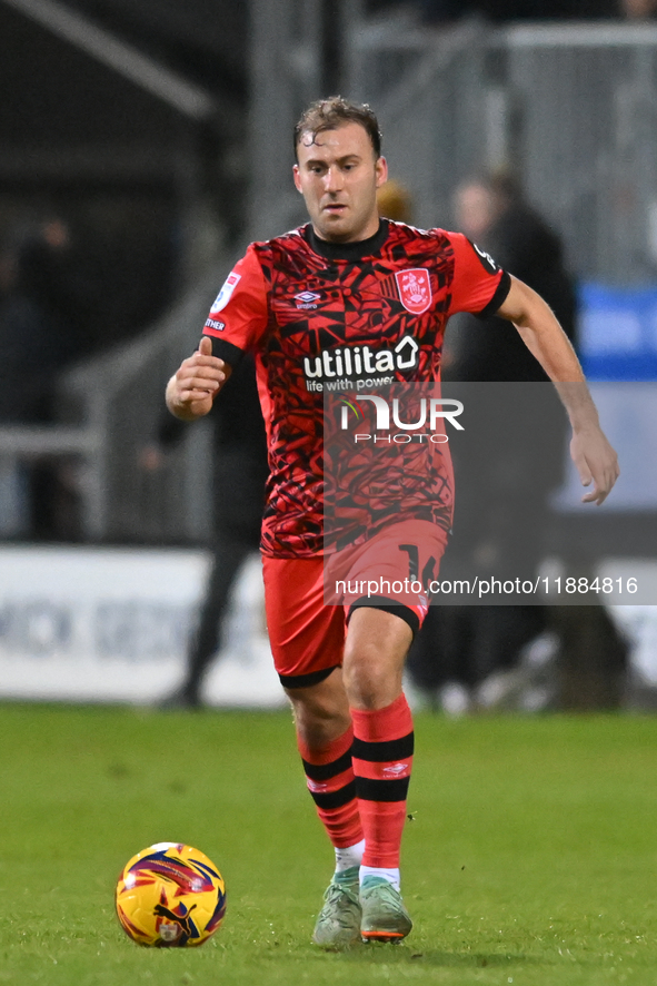 Herbie Kane (16 Huddersfield) goes forward during the Sky Bet League 1 match between Cambridge United and Huddersfield Town at the Cledara A...