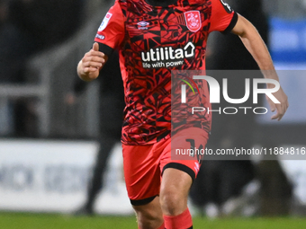 Herbie Kane (16 Huddersfield) goes forward during the Sky Bet League 1 match between Cambridge United and Huddersfield Town at the Cledara A...