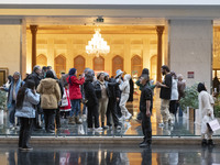 Iranian families visit the Iran Mall shopping mall in northwestern Tehran, Iran, on December 20, 2024, during Yalda Night celebrations. Yald...