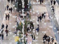 Iranian shoppers walk at the Iran Mall shopping mall in northwestern Tehran, Iran, on December 20, 2024, during Yalda Night celebrations. Ya...