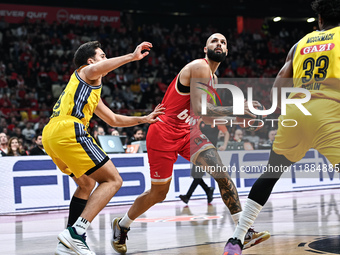 Evan Fournier of Olympiacos Piraeus competes with Matteo Spagnolo of Alba Berlin during the Euroleague, Round 17 match between Olympiacos Pi...