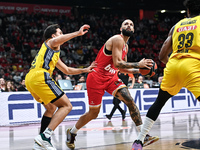 Evan Fournier of Olympiacos Piraeus competes with Matteo Spagnolo of Alba Berlin during the Euroleague, Round 17 match between Olympiacos Pi...