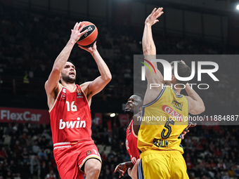 Kostas Papanikolaou of Olympiacos Piraeus competes with Yanni Wetzell of Alba Berlin during the Euroleague, Round 17 match between Olympiaco...