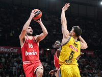 Kostas Papanikolaou of Olympiacos Piraeus competes with Yanni Wetzell of Alba Berlin during the Euroleague, Round 17 match between Olympiaco...