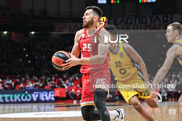 Alec Peters of Olympiacos Piraeus competes with Elias Rapieque of Alba Berlin during the Euroleague, Round 17 match between Olympiacos Pirae...