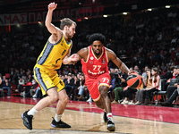 Shaquielle Mckissic of Olympiacos Piraeus competes with Malte Delow of Alba Berlin during the Euroleague, Round 17 match between Olympiacos...