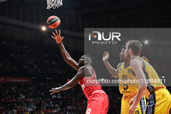 Moustapha Fall of Olympiacos Piraeus competes with David Mccormack of Alba Berlin during the Euroleague, Round 17 match between Olympiacos P...