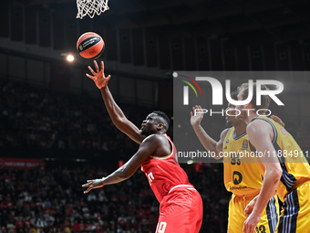 Moustapha Fall of Olympiacos Piraeus competes with David Mccormack of Alba Berlin during the Euroleague, Round 17 match between Olympiacos P...