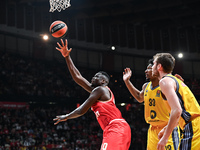 Moustapha Fall of Olympiacos Piraeus competes with David Mccormack of Alba Berlin during the Euroleague, Round 17 match between Olympiacos P...