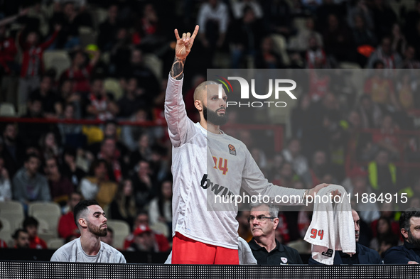 Bench player 94 Evan Fournier of Olympiacos Piraeus participates in the Euroleague, Round 17 match between Olympiacos Piraeus and Alba Berli...