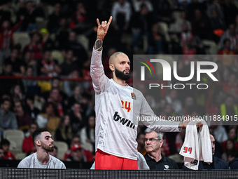 Bench player 94 Evan Fournier of Olympiacos Piraeus participates in the Euroleague, Round 17 match between Olympiacos Piraeus and Alba Berli...