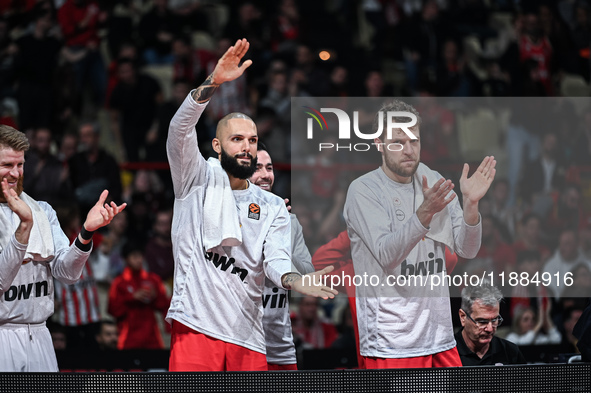 Bench players 94 Evan Fournier and 14 Sasha Vezenkov of Olympiacos Piraeus during the Euroleague, Round 17 match between Olympiacos Piraeus...