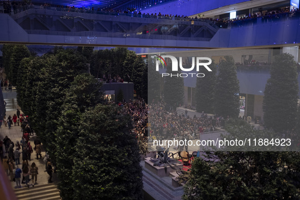 Iranian families participate in Yalda Night celebrations at the Iran Mall shopping mall in northwestern Tehran, Iran, on December 20, 2024....