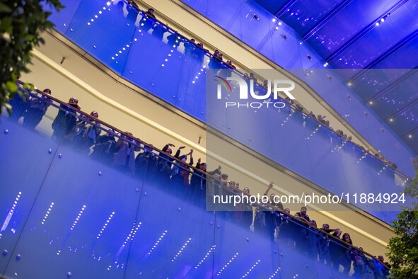 Iranian families participate in Yalda Night celebrations at the Iran Mall shopping mall in northwestern Tehran, Iran, on December 20, 2024....