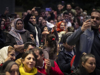 A young Iranian girl dances during Yalda Night celebrations at the Iran Mall shopping mall in northwestern Tehran, Iran, on December 20, 202...