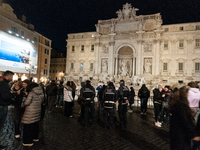 Restoration work on the Trevi Fountain is completed. Workers clean the lower part and fill the joints over two months, and they remove the s...