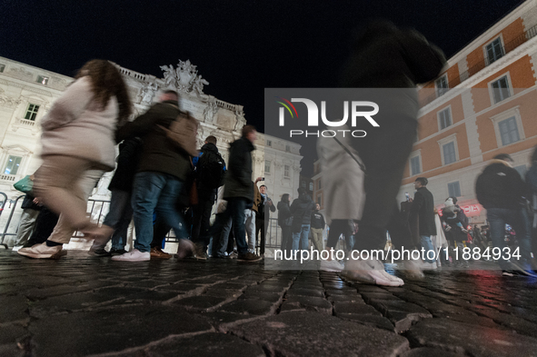 Restoration work on the Trevi Fountain is completed. Workers clean the lower part and fill the joints over two months, and they remove the s...