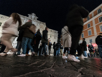 Restoration work on the Trevi Fountain is completed. Workers clean the lower part and fill the joints over two months, and they remove the s...