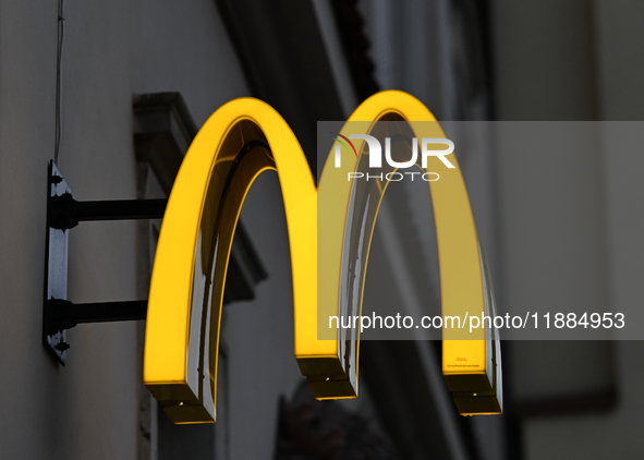 KRAKOW, POLAND - DECEMBER 20:   
The McDonald's logo displayed on a restaurant facade, on December 20, 2024 in Krakow, Poland. 