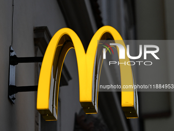 KRAKOW, POLAND - DECEMBER 20:   
The McDonald's logo displayed on a restaurant facade, on December 20, 2024 in Krakow, Poland. (