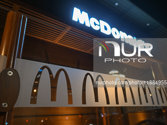 KRAKOW, POLAND - DECEMBER 20:   
The McDonald's logo displayed in a restaurant windows, on December 20, 2024 in Krakow, Poland. (