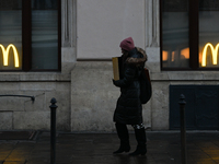 KRAKOW, POLAND - DECEMBER 20:   
The McDonald's logo displayed in a restaurant windows, on December 20, 2024 in Krakow, Poland. (