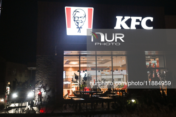 KRAKOW, POLAND - DECEMBER 20:   
The KFC logo displayed in a restaurant windows, on December 20, 2024 in Krakow, Poland. 