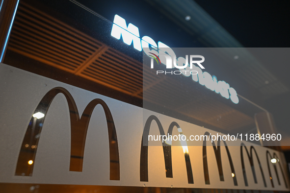 KRAKOW, POLAND - DECEMBER 20:   
The McDonald's logo displayed in a restaurant windows, on December 20, 2024 in Krakow, Poland. 