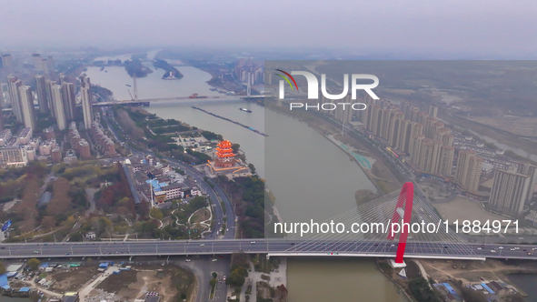 Cargo ships loaded with agricultural supplies, building materials, coal, and other goods sail on the Beijing-Hangzhou Grand Canal in Suqian,...