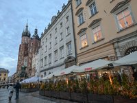 KRAKOW, POLAND - DECEMBER 20:   
A view of heated restaurant gardens, adorned with festive Christmas lights and decorations, bring warmth to...