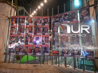 KRAKOW, POLAND - DECEMBER 20:   
Images of people kidnapped by Hamas, is displayed at the entrance to the Jewish Center in Krakow's Kazimier...