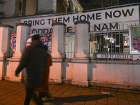 KRAKOW, POLAND - DECEMBER 20:   
A giant 'Bring Them Home Now' message, accompanied by images of people kidnapped by Hamas, is displayed at...