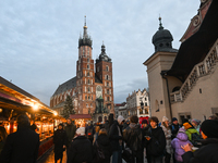 KRAKOW, POLAND - DECEMBER 20:   
A Christmas tree stands near St. Mary's Basilica in Krakow's UNESCO-listed Main Square on December 20, 2024...