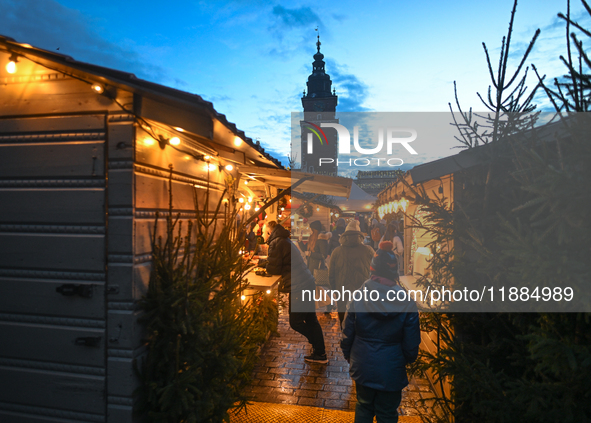 KRAKOW, POLAND - DECEMBER 20:   
A view of the Christmas Market in Krakow's UNESCO-listed Market Square, with festive stalls and holiday dec...