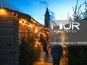 KRAKOW, POLAND - DECEMBER 20:   
A view of the Christmas Market in Krakow's UNESCO-listed Market Square, with festive stalls and holiday dec...