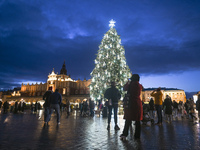 KRAKOW, POLAND - DECEMBER 20:   
An illuminated Christmas tree stands in Krakow's UNESCO-listed Main Square, on December 20, 2024 in Krakow,...