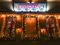 KRAKOW, POLAND - DECEMBER 20:   
A sign at the entrance to Pierogarnia 'Krakowiacy,' specializing in traditional Polish handmade dumplings,...