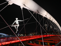 KRAKOW, POLAND - DECEMBER 20:   
View of Krakow's Father Bernatek Footbridge, illuminated for the Christmas holidays, on December 20, 2024 i...