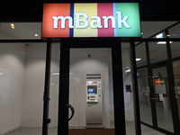 KRAKOW, POLAND - DECEMBER 20:   
The mBank logo displayed at the entrance to a bank office,, on December 20, 2024 in Krakow, Poland. (