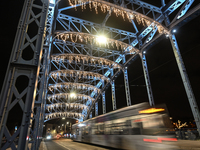 KRAKOW, POLAND - DECEMBER 20:   
A view of the Jozef Pilsudski Bridge decorated for Christmas season, on December 20, 2024 in Krakow, Poland...